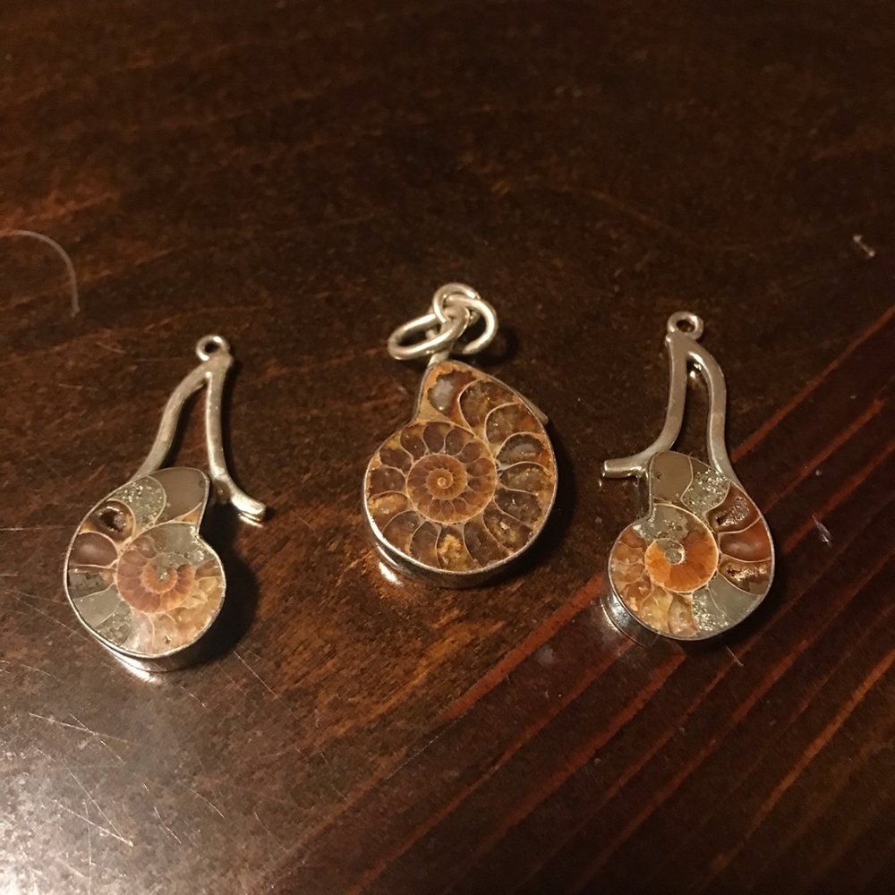 Three silver/shell pieces for a necklace